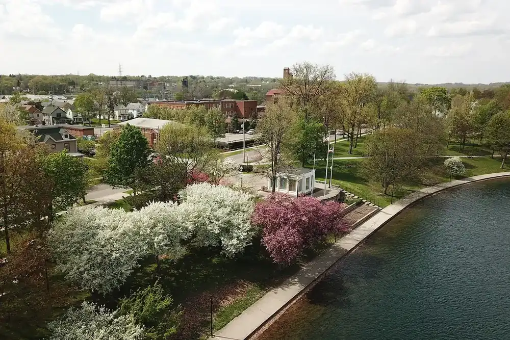 Aerial view of Lake Anna park with blossoming trees in spring, Barberton, Ohio