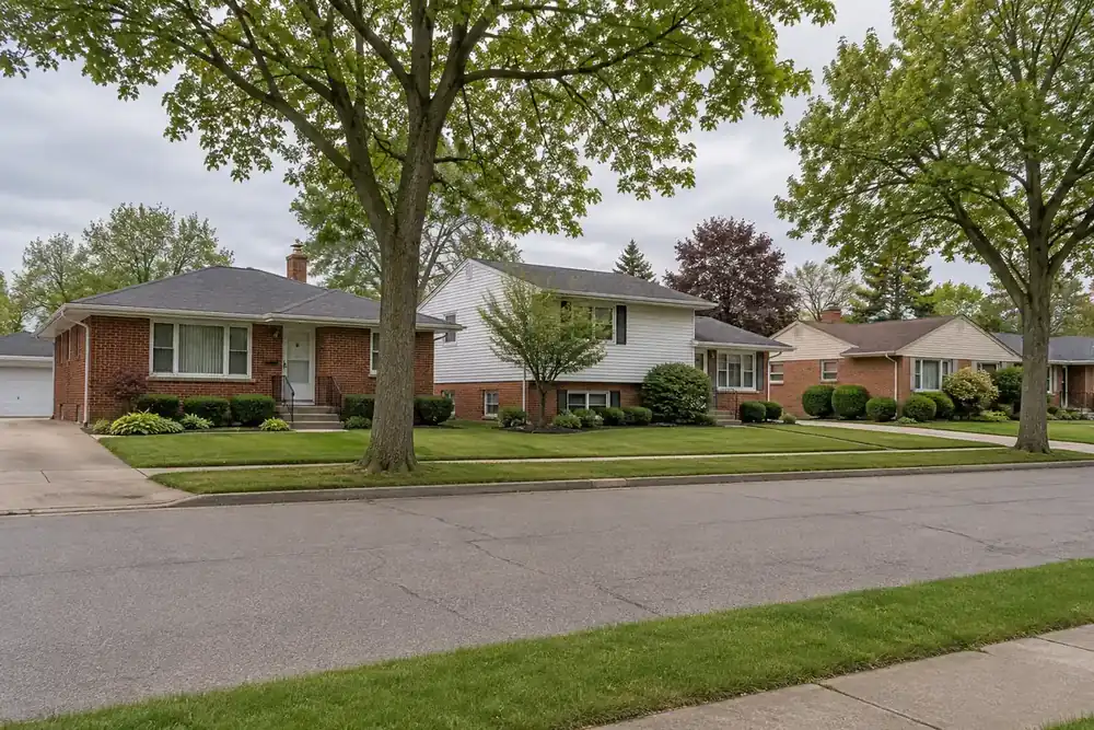 Brick ranch houses along a tree-lined street in Brook Park