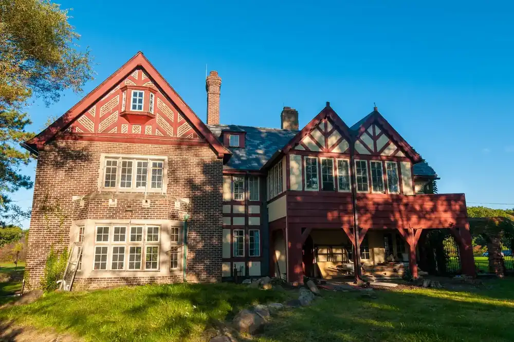 Brick and half-timbered Longwood Manor on a green lawn in Macedonia, Ohio